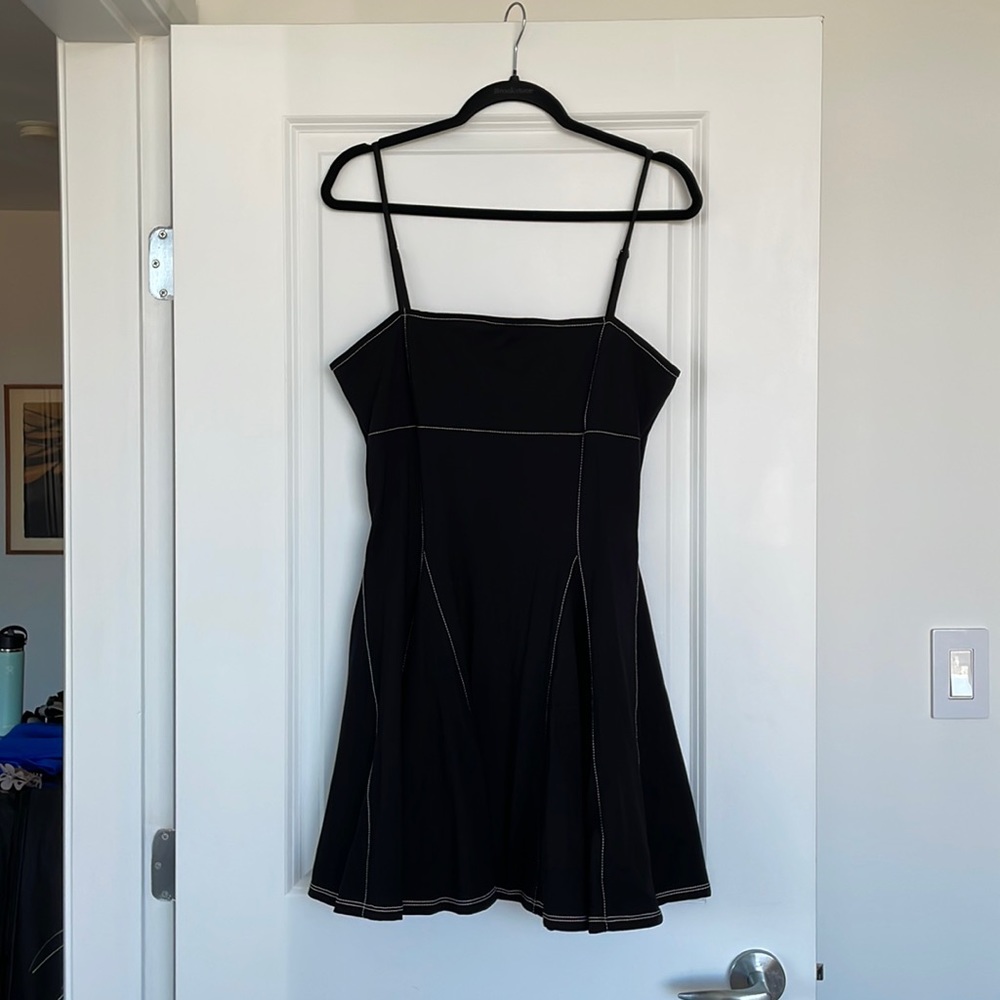 Cute black stretch skater dress with white stitching